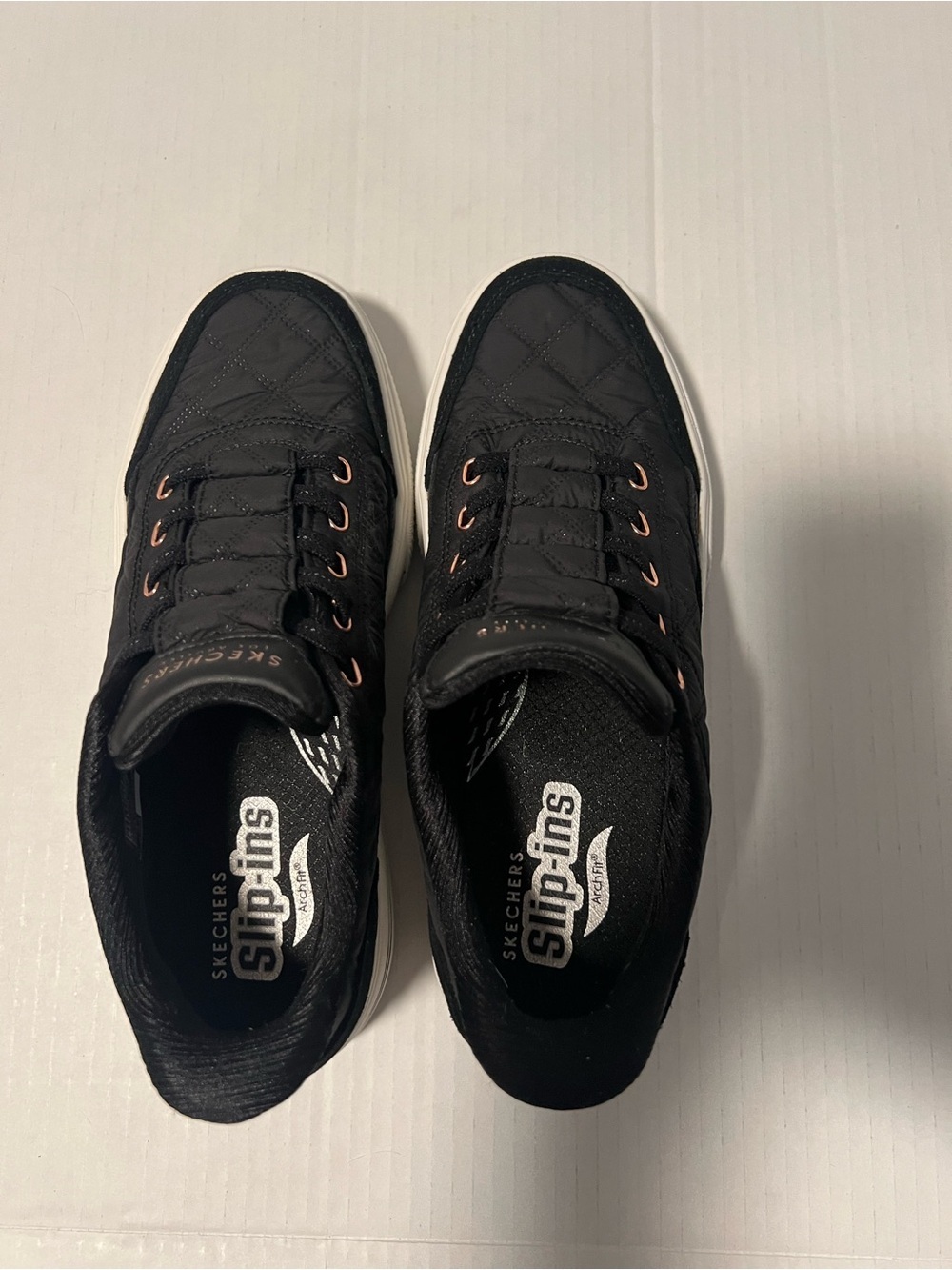 Skechers Black Quilted Slip-On Sneakers with Rose Gold Eyelets